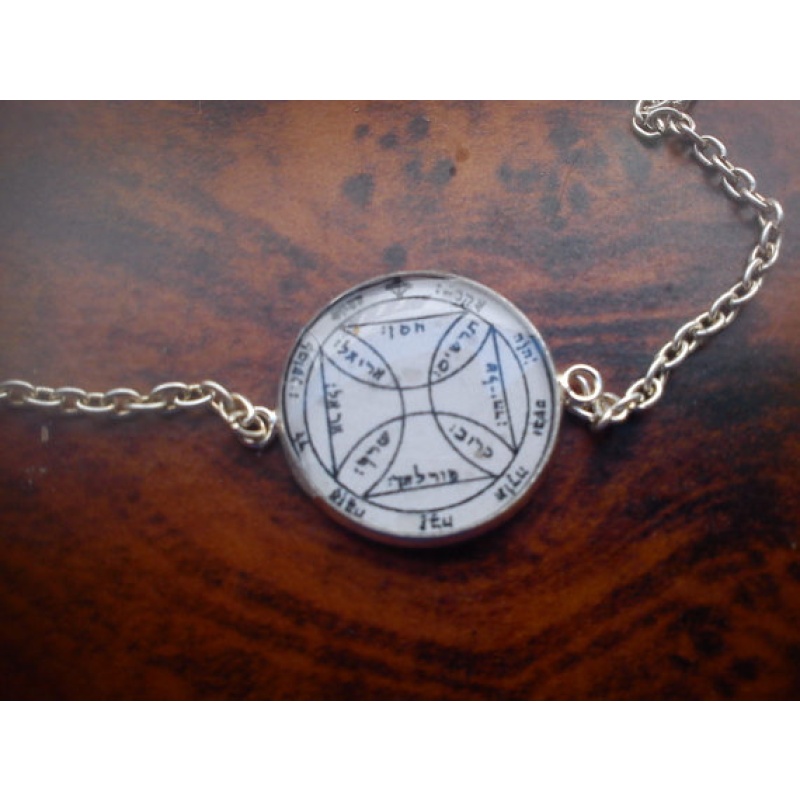 Seventh Pentacle of Sun Bracelet. This seal reputedly releases one from prison, opening all locks & breaking all fetters which bind one